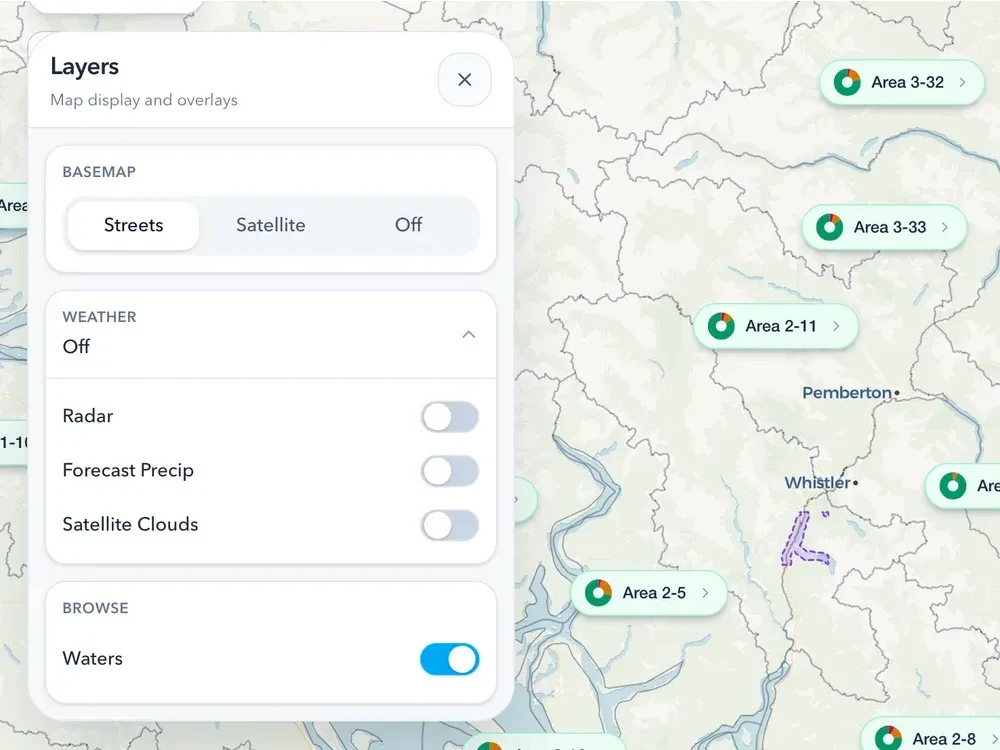 The Layers drawer open on the map, listing the weather and map layers that can be switched on and off