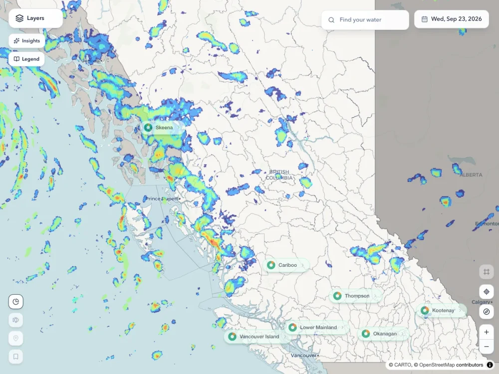 Forecast precipitation drawn over the map of British Columbia, showing cells scattered down the north coast and across the interior, with the fishing region badges beneath it